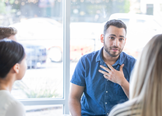 young people at a meeting